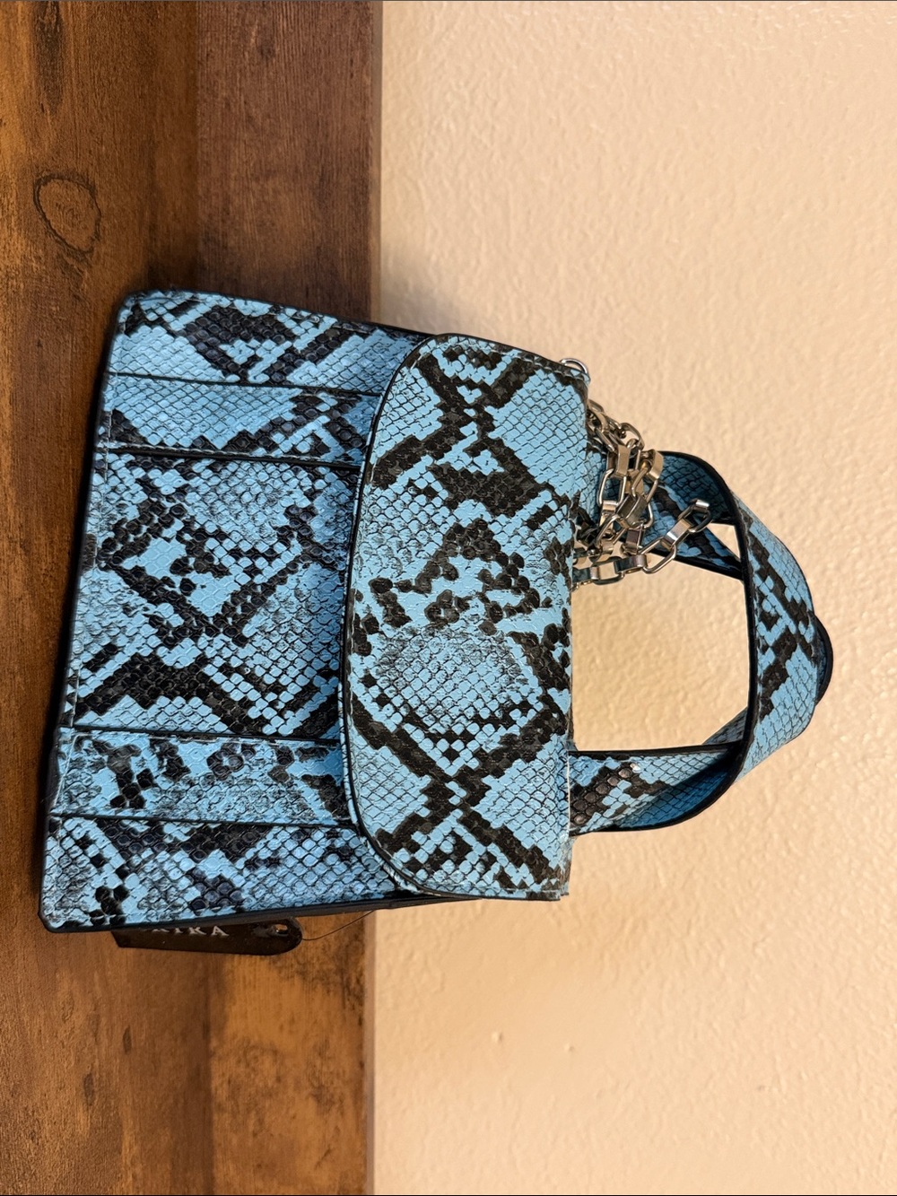 AKIRA Blue and Black Snake-Print Crossbody Bag with Chain Strap
